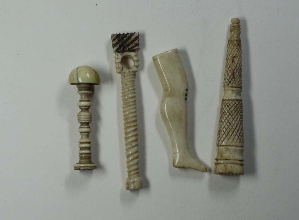 Four Ivory Antique Pipe Tampers Image
