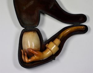 Hand Clasping a Bowl Meerschaum Pipe Image