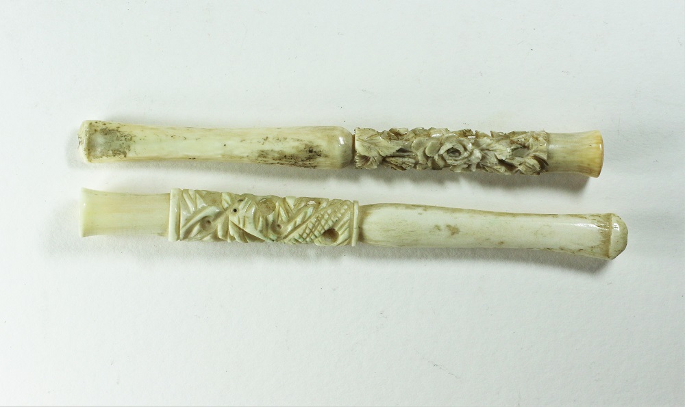 Two Carved Bone Cigarette Holders Image